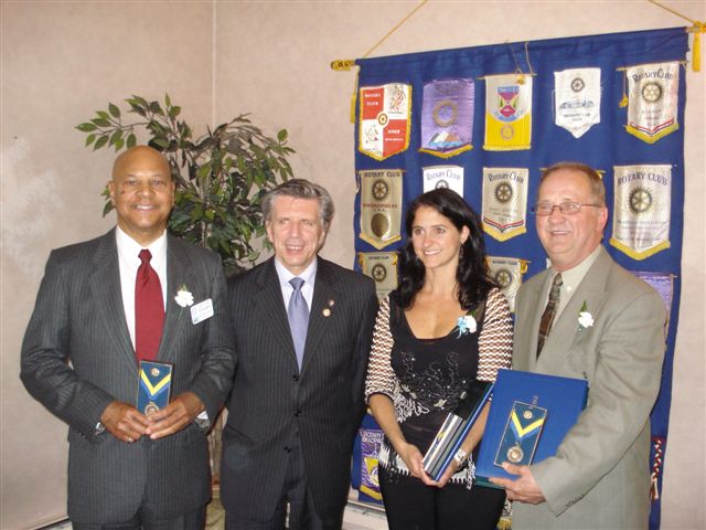 From left to right: Loftus Benjamin, Leftenant-Governor Herménégilde Chiasson, Dr. Colleen O'Connell and Josh Ouellette
