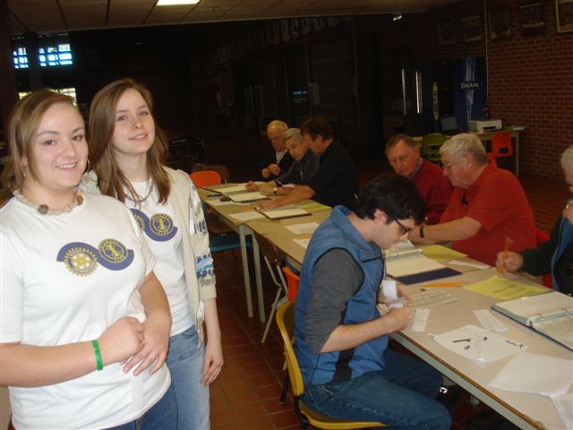 Rotarians and Interact members keeping the books up to date.